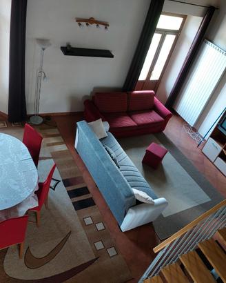 Bilocale loft 80mq parzialmente arredato