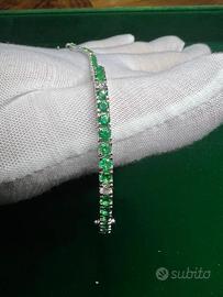 Bracciale tennis oro bianco, smeraldi e diamanti
