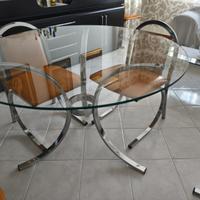 Trattabile.Tavolo rotondo in vetro con 6 sedie.