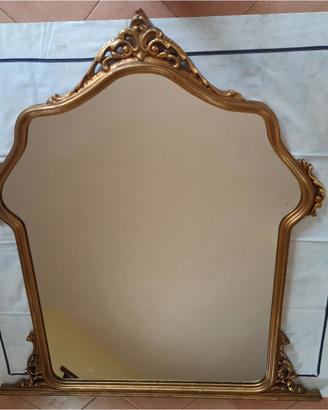 Specchiera antica artigianale in foglia oro.