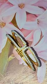 Bracciale rigido dorato con perline