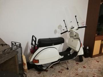 Vespa px150e targa oro