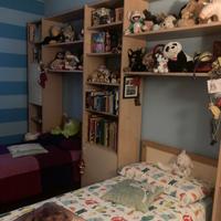 Camera con 2 letti, armadio 4 stagioni, libreria