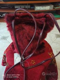 borsa con pelicia   contro vento