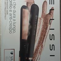 piastra per capelli a vapore