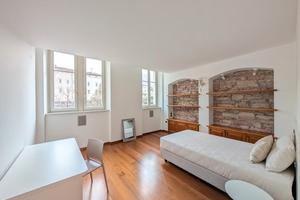 Ampie stanze singole in un appartamento splendido