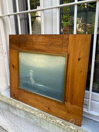 Quadro d Donna con bicicletta di fronte al mare