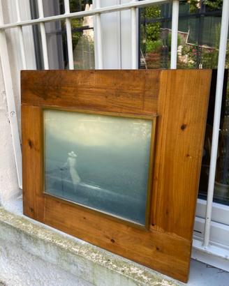 Quadro d Donna con bicicletta di fronte al mare