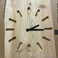 Orologio in legno da parete