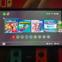 Nintendo switch oled + 4 giochi + pad e altro