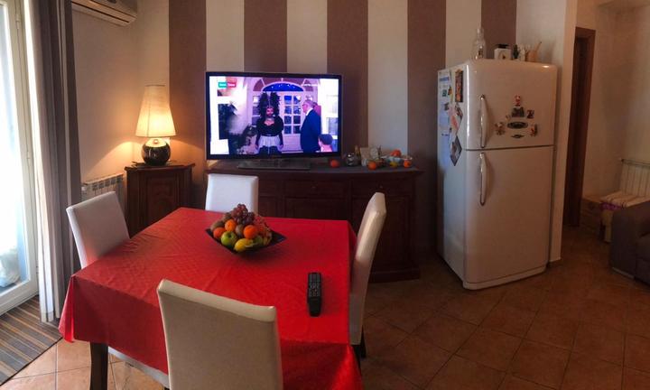 Appartamento con mansarda, terrazza e posto auto