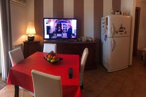 Appartamento con mansarda, terrazza e posto auto