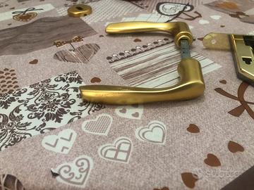 Maniglie porte interne color oro