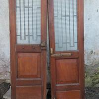 Porte in legno di entrata con inferiate