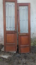 Porte in legno di entrata con inferiate