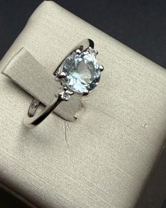ANELLO ACQUAMARINA 1 KT  DIAMANTI LATERALI O,10 CT