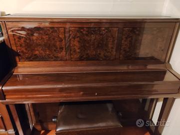 pianoforte verticale in radica 