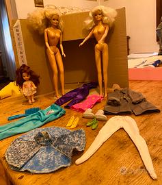 Lotto bambole abiti accessori Barbie Ken ……