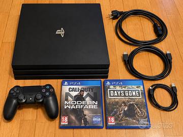 PS4 Pro con joystick e 2 giochi