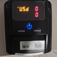 Controlla banconote come nuova