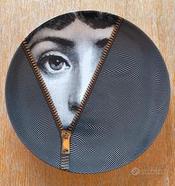 Piatto oro Fornasetti 