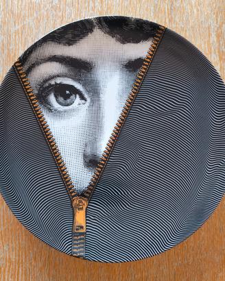 Piatto oro Fornasetti 
