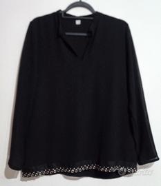 Blusa con dettagli in ecopelle 