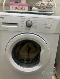 Stanza letto cucina lavatrice