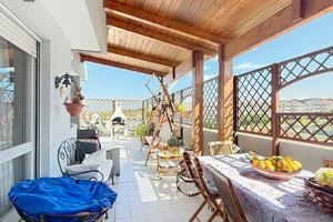 Luminoso Attico con Ampia Terrazza Panoramica