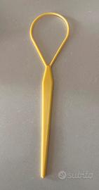 Aggeggio per capelli