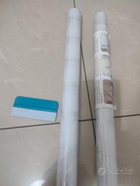 vetrofania adesiva con spatola 