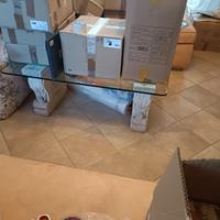 Tavolo salotto in cristallo con base due capitelli