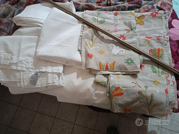 8 tende  più  2   bastoni ferro