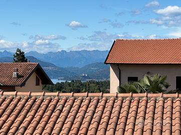 Panoramico e arredato trilocale con box e cantina