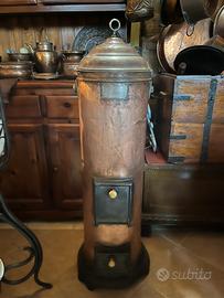 Scaldabagno antico in rame e ghisa