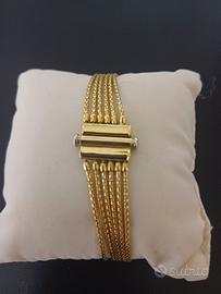 Bracciale a 6 fili in oro 18Kt.