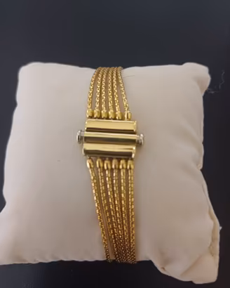 Bracciale a 6 fili in oro 18Kt.