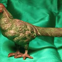 Antica scultura pavone in bronzo