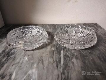 Due posacenere cristallo decorati. 