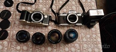 Macchine fotografiche, obiettivi e flash