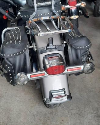 Barra frecce posteriori Harley Softail evo