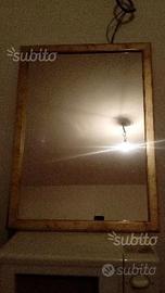 Specchio con cornice dorata 55×75