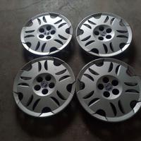 COPRICERCHI-PZ.4-ORIGINALI FIAT-DA 15-5 FORI-FOTO