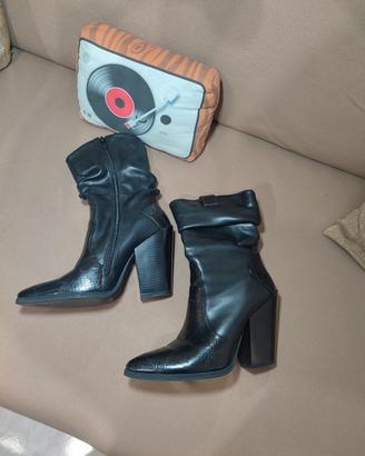 Camperos neri pitonati