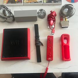Lotto console Nintendo wii mini con 8 giochi