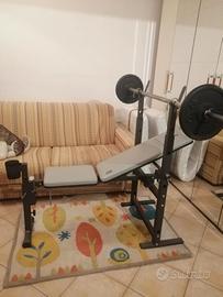 panca professionale con bilancere e pesi