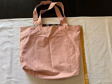 Borsa tote rosa con perline e fodera floreale