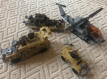 Elicottero, carri armati e motoscafo militari