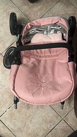 Passeggino giocattolo per bambole