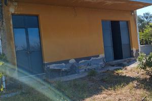 Terreno agricolo con annessa casa